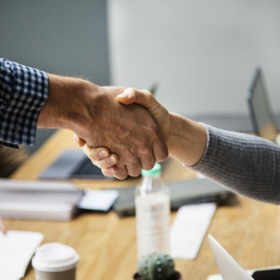 Business people shaking hands in agreement
